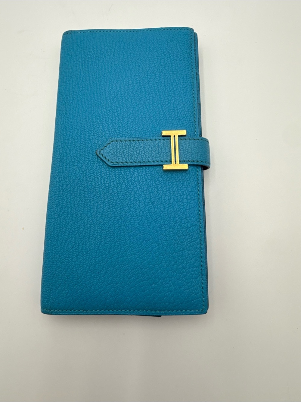 Hermes blue Bearn wallet with gold hardware